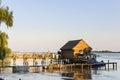 Traditional wood house on water