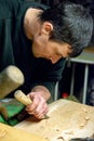 Traditional wood worker in Romania , carpenter