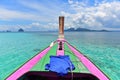 Traditional wooden boat anchored at the crystal clear part of Andaman Sea Royalty Free Stock Photo