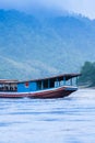 Traditional wooden boat on the Mekong River in the morning Royalty Free Stock Photo
