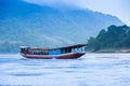 Traditional wooden boat on the Mekong River in the morning Royalty Free Stock Photo