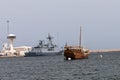 Traditional Wooden Boat and South Korean Military Ship in Muscat, Oman - March 2023