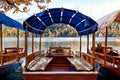 Traditional wooden boats on Lake Bled, Slovenia. Royalty Free Stock Photo