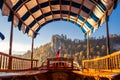 Traditional wooden boats on lake Bled, Slovenia. Royalty Free Stock Photo