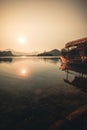 Traditional wooden boats Pletna on the backgorund of Church on the Island on Lake Bled, Slovenia. Europe Royalty Free Stock Photo