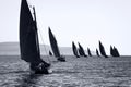 Traditional wooden boats with read sail. Royalty Free Stock Photo