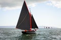 Traditional wooden boats with red sail. Royalty Free Stock Photo