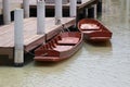 Traditional Wooden Boats Of Thailand Floating On The Water