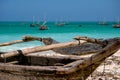 Traditional wooden dhow boats on the White Sand Beach with amazing turquoise water in the Indian ocean at Nungwi village Royalty Free Stock Photo