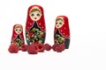 Traditional wooden doll`s Matreshka Babushka with raspberries