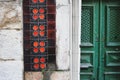 Traditional wooden door and ceramic tiles mosaic wall in Lisbon, Portugal Royalty Free Stock Photo