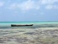 Traditional Wooden Dug Out Canoe On The Water Royalty Free Stock Photo