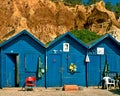 Blue fisherman huts at the Albufeira Oura beach, Algarve - Portugal