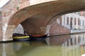 Traditional wooden fishing boats in the town of Comacchio Royalty Free Stock Photo