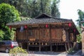Traditional wooden folk house of Bouyei (Buyi) people in Qujing City, Yunnan, China. Royalty Free Stock Photo