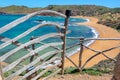 Traditional wooden gate near Cala Cavalleria beach in Menorca, Balearic islands Spain