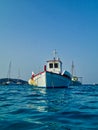 Traditional Wooden Greek Fishing Boat Moored in Open Water, Greece Royalty Free Stock Photo