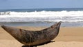 Traditional wooden hand made African / Malagasy fishing boat - piroga on the sandy beach of Indian ocean in Madagascar