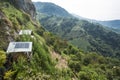 Traditional wooden house with solar panels in the mountains of Colombia Royalty Free Stock Photo