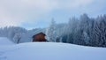 Traditional wooden mountain hut in beautiful winter landscape. Vorarlberg, Austria. Royalty Free Stock Photo
