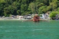 traditional wooden outrigger boats on palawan island