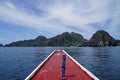traditional wooden outrigger boats on palawan island