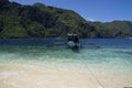 traditional wooden outrigger boats on palawan island