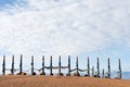 Traditional wooden poles to the hitching post serge. Prayer flags on Olkhon, Buryat Region, Russia, Siberia.