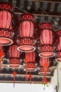 Traditional wooden red lantern chandelier in ancient Chinese building Royalty Free Stock Photo