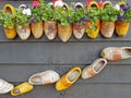 Traditional wooden shoes decorated with flowers in Netherlan