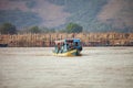 Traditional Wooden Tourist Boat Moving On Tonle Sap Lake In Siem Reap, Cambodia.