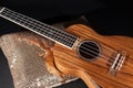 Traditional wooden ukulele in close up. Hawaiian uke on display.