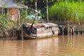 Traditional wooden vietnamese boat at Mekong Delta