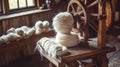 Traditional Wool Spinning Wheel with Freshly Spun Wool in Rustic Workshop Setting Royalty Free Stock Photo