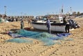 Fishermen working on the nets