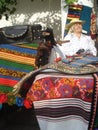 Traditional woven rugs stall at traditional ware fair at Romanian Peasant Museum in Bucharest, Romania on September 13, 2015 Royalty Free Stock Photo