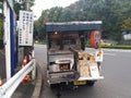 Japanese food truck selling roasted sweet potatoes at foot of Tokyo Tower