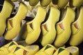 Traditional yellow painted wooden shoes Royalty Free Stock Photo