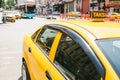 A traditional yellow taxi on the street in Istanbul, Turkey. Urban life style. Transportation of passengers. Waiting for