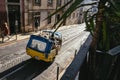 Traditional yellow three wheeled taxi