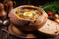 Traditional zurek. Polish rye soup. Sour bread soup served with boiled egg and sausage