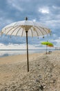 Traditionall colored Balinese umbrellas on the beach of Gili Air