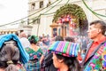 Traditionallly dressed locals participate in religious procession, Guatemala