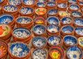 Traditionally decorated Portuguese terracotta dishes, Portugal..