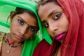 Traditionally dressed unidentified Indian women.They generally use colorful saris and scarfs for any occasions like shopping. Royalty Free Stock Photo