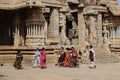 Traditionally Dressed Visitors, Ranga Mantapa in Shree Vijaya Vitthala or Vittala Temple. Hampi, near Hospete, Karnataka, India