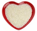 Traditionally Indian basmati Rice in red heart Royalty Free Stock Photo