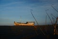 Abandoned fishing boat on the beach Royalty Free Stock Photo