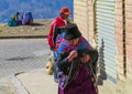 Traditionaly dressed latin american women in the city Royalty Free Stock Photo