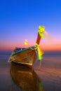 Traditionnal long tail boat at sunset Royalty Free Stock Photo